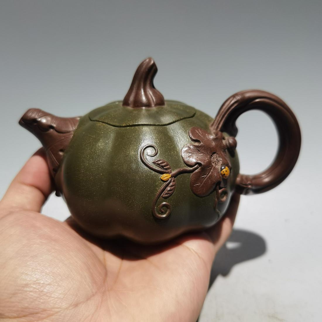 Chinese Yixing Zisha Clay Pumpkin Shape Teapot w Artist Signed: Title: Chinese Yixing Zisha Clay Pumpkin Shape Teapot w Artist Signed Date Period: After 1900 Origin: Chinese Materials: Zisha Clay Dimensions: Dimension: 140 x 90(mm)5.51 x 3.54(inches) Additional In