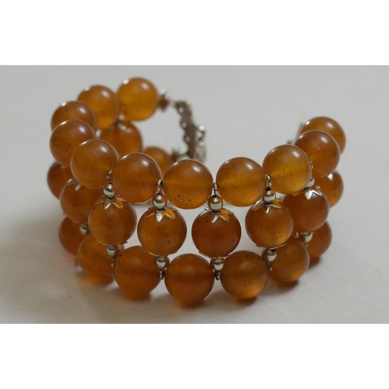 45 g. Natural Baltic amber bracelet cognac color: Weight: 45 gram Beads size: 12x12 mm. Length: 85 mm (size is adjustable) Stone: 100% natural Baltic amber Treatment: 100% natural no treatment Condition: as on the photo (good) Tested 100% natural Bal