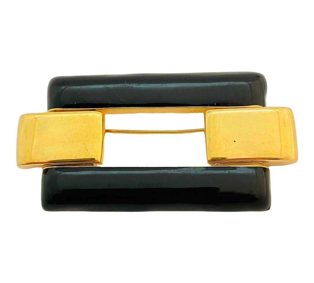 Vintage MONET gold enamel designer runway brooch: Details: Signed MONET gold tone with enamel vintage designer runway brooch MEASUREMENTS: 2 1/2" by 1 1/4" CONDITION: excellent vintage condition with minimal signs of wear Reserve: $56.00 Shipping: Do