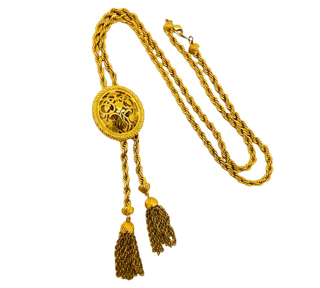 Vintage TRIFARI gold tassel chain designer runway necklace: Details: Signed TRIFARI TM gold tone vintage designer runway necklace MEASUREMENTS: drops 19" CONDITION: excellent vintage condition with minimal signs of wear Reserve: $109.00 Shipping: Domestic: Fla