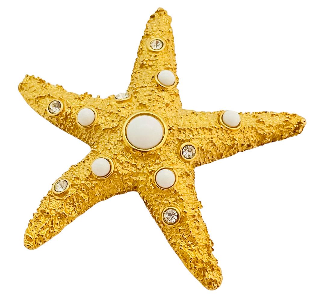Vintage TRIFARI huge starfish gold lucite rhinestone designer runway brooch: Details: Signed TRIFARI gold tone with rhinestones and lucite cabochons vintage designer runway brooch MEASUREMENTS: 2 3/4" in diameter CONDITION: excellent vintage condition with minimal signs of wea
