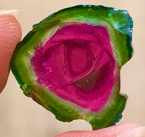 9 Carats Amazingly Damage Free Purple Pink Green Tri Color Gemmy Watermelon Tourmaline Carved: Treatment: None Condition: Natural Name: Tourmaline Color: Tri Color, Green, Pink, Purple Weight: 9 C.T Size: 10x8x3 M.M Origin: Afghanistan Shape: Slice/Crystal Reserve: $120.00 Shipping: Domestic: F