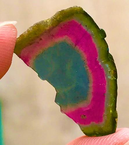 18 Carats Top Quality Damage Free Purple Pink Green Tri Color Gemmy Watermelon Tourmaline Crystal: Treatment: None Condition: Natural Name: Tourmaline Color: Tri/Green,Pink,Purple Weight: 18 C.T Size: 25x15x3 M.M Origin: Afghanistan Shape: Slice/Crystal Reserve: $155.00 Shipping: Domestic: Flat-rat
