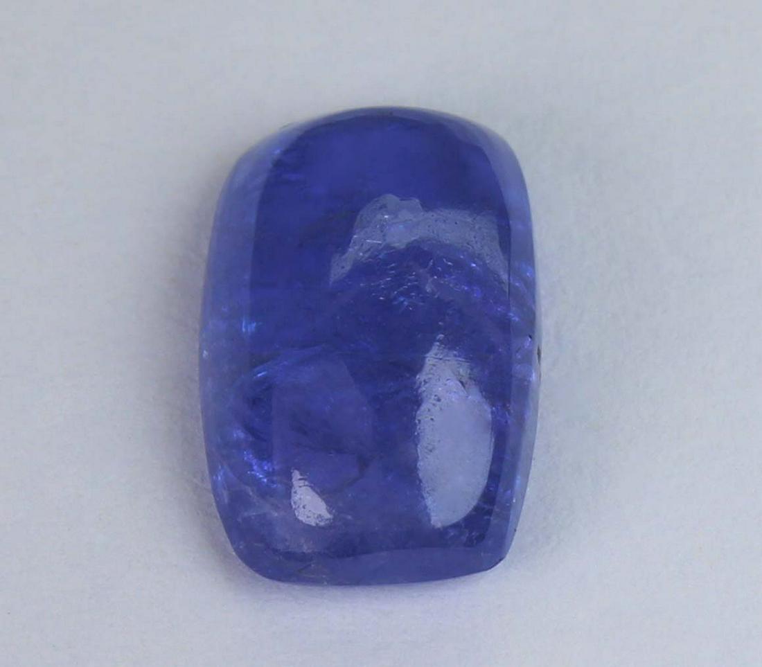 3.14 Cts Natural Tanzanite: No Reserve! Title: 3.14 Cts Natural Tanzanite Gemstone : Natural Tanzanite Shape and cut : Oval Cabochan Weight : 3.14 Carats Measurements : 11x7 mm Color : Violet Transprancy : Transparent Treatment 