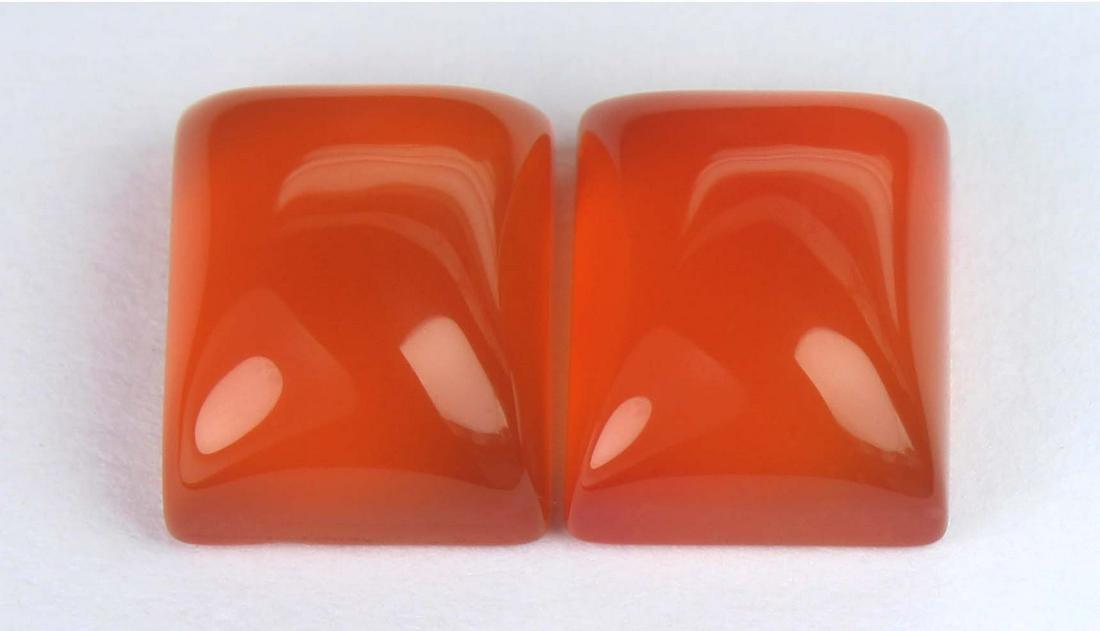 8.09 Cts Natural Carnelian Lot: No Reserve! Title: 8.09 Cts Natural Carnelian Lot Gemstone : Natural Carnelian Weight : 8.09 carat Shape : Rectangular Caboshon Dimensions : 10x8 mm Number of Stone : 2 Color : Orange Origin : India T