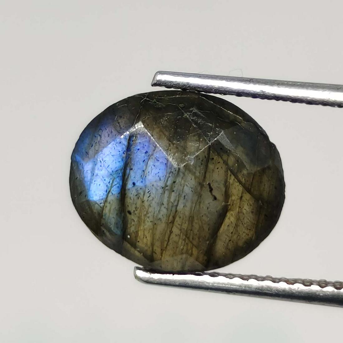 3.75 ct Natural Labradorite: No Reserve! Title: 3.75 ct Natural Labradorite Description: Gemstones: Labradorite Carat Weights: 3.75 ct Size/Dimensions: 11 X 9 mm Origin : Labrador Gemstone: Labradorite Shipping: Domestic: