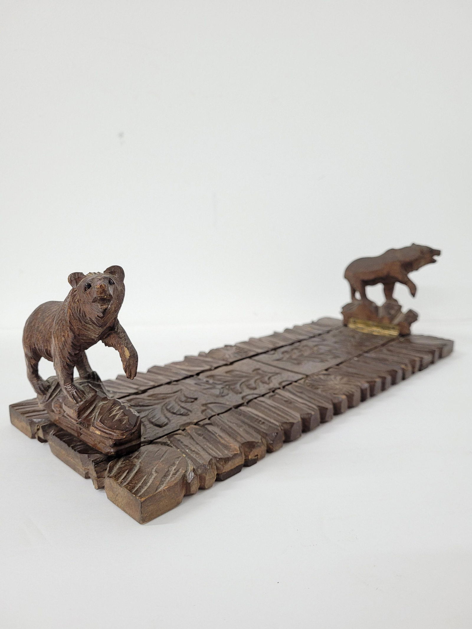 Antique Hand Carved Swiss Black Forest Bear Book Holder Rack Bookends: Vintage from the 1920s Materials: wood Width: 13.5 inches Height: 4.5 inches Depth: 6.5 inches Description Antique Hand Carved Swiss Black Forest Bear Book Holder Rack Bookends Black Forest Carved Bea