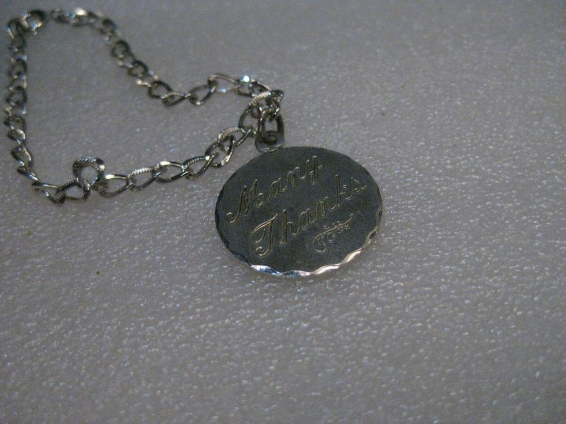 Vintage Sterling Silver Charm Bracelet, Many Thanks Well's Charm, 7" 6.25gr.: Vintage Sterling Silver Charm Bracelet, 7", with a Many Thanks Charm with scroll on front and on the back engraved Drumheller, P.T.A., 9-17-74. Weight is 6.25 grams. The charm is signed Wells. It has