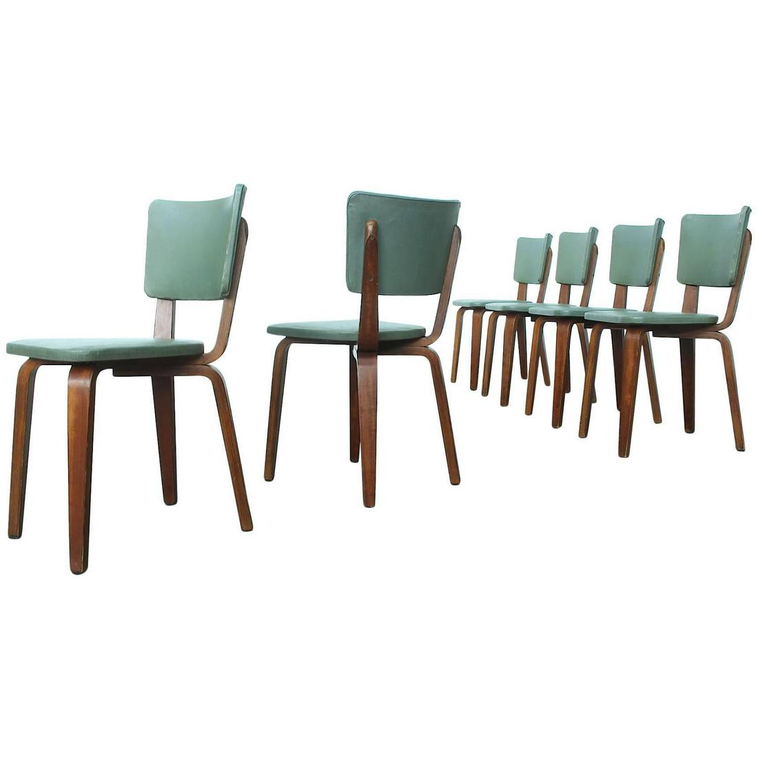 Rare Set of Six Plywood Dining Chairs by Cor Alons for Gouda Den Boer: Beautiful early mid-century Dutch design dining chairs by Cor Alons manufactured by furniture factory Gouda Den Boer Holland, circa 1949. The chairs are made of laminated birchwood and are upholstered