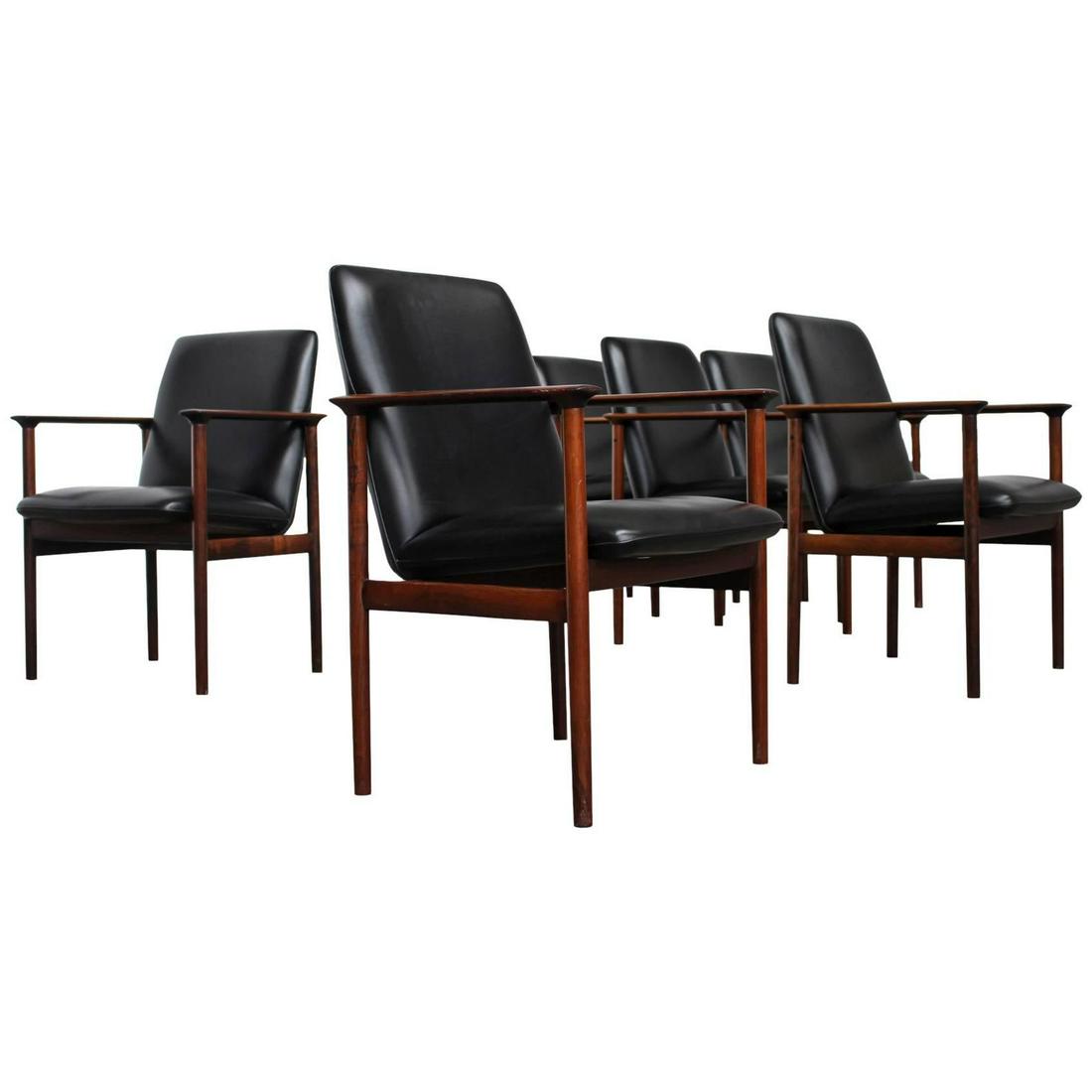 Set of Six Rosewood Conference Chairs by Arne Vodder for Sibast Denmark 1960s: Set of 6 large conference or dining chairs designed by Arne Vodder for Sibast Furniture Denmark, 1960s. The chairs are made out of top quality solid Brazilian rosewood and upholstered with black leath