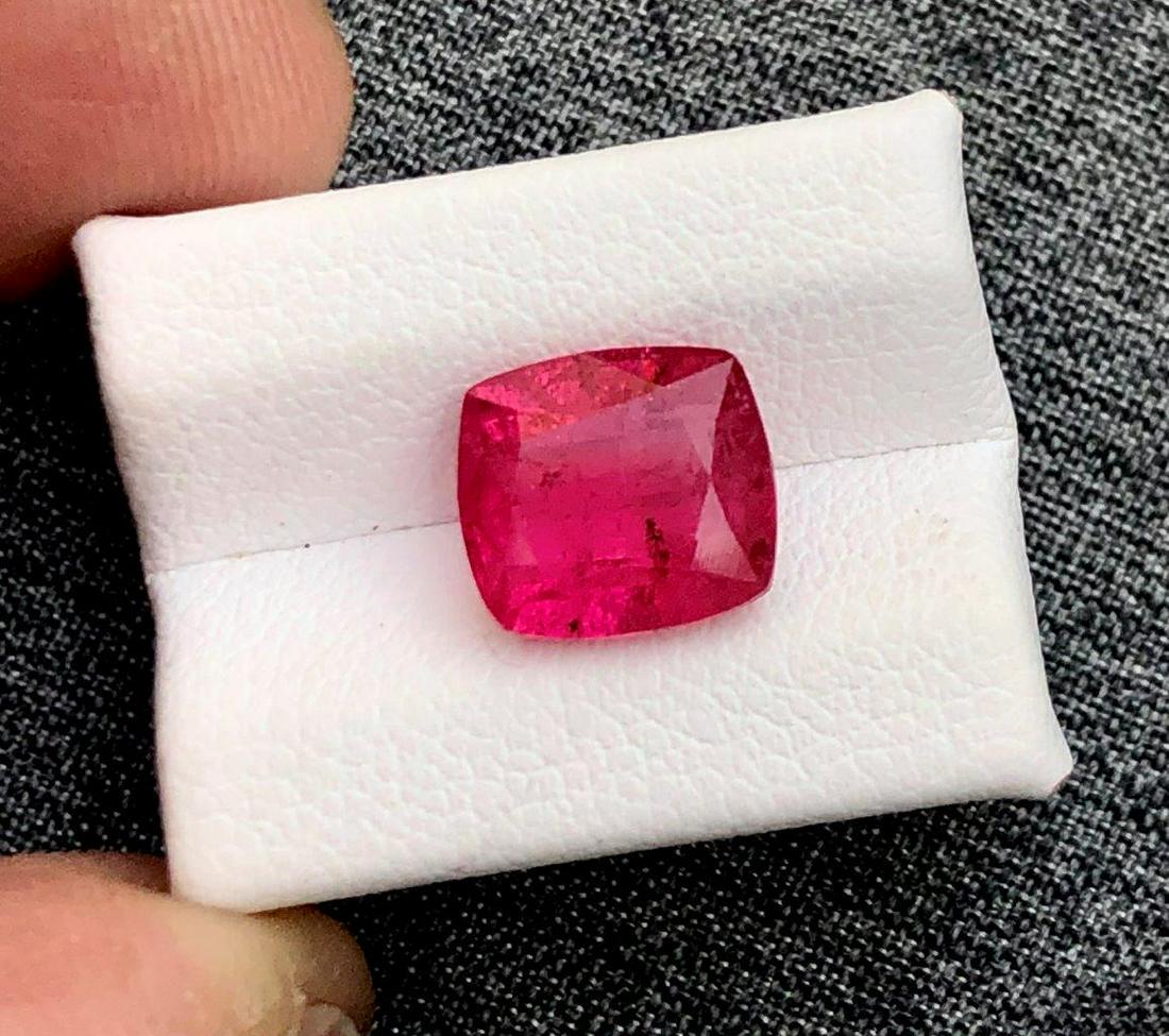 Cushion Cut Rubelite Tourmaline - 3 crts: Title: Cushion Cut Rubelite Tourmaline - 3 crts Gemstone: Tourmaline Carat Weights: 3 Carats Size/Dimensions: 9X8X5 mm Additional Information: Cushion Cut Rubelite Tourmaline - 3 crts Reserve: $120.00