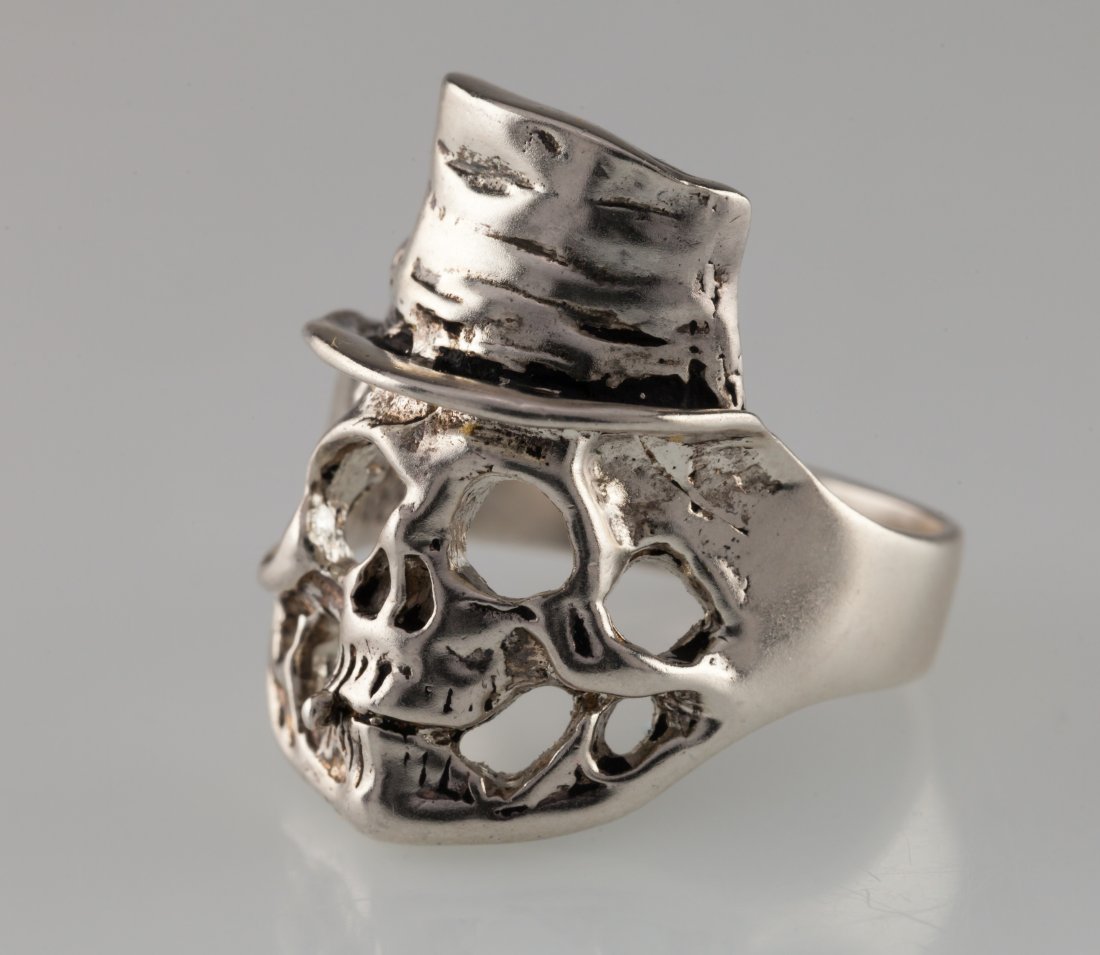 Silver Skull Ring: Title: Silver Skull Ring Description: Creative and fun skull wearing top hat silver ring in size 11.25 with a weight of 14.3 grams Materials: .925 Silver Reserve: $30.00 Shipping: Domestic: Free shipp