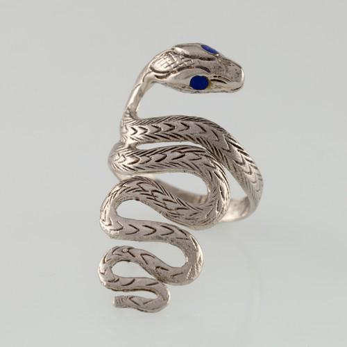 Silver Snake Ring: Title: Silver Snake Ring Description: Long snake in several s shapes with blue crystal eyes in size 6.5 and a weight of 5 grams Materials: .925 Silver Reserve: $15.00 Shipping: Domestic: Free shipping
