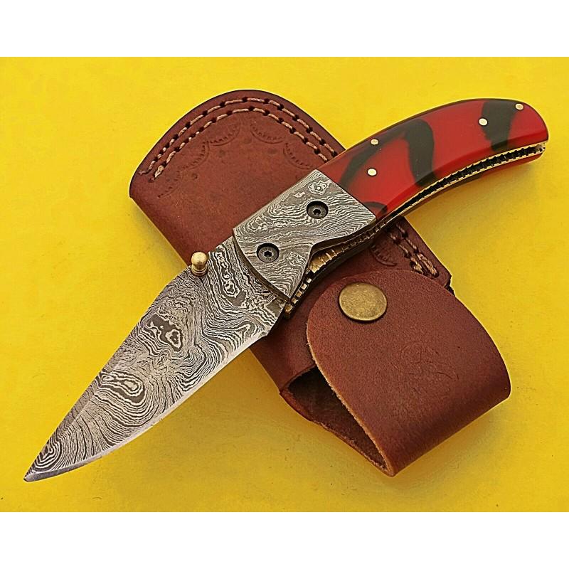 Folding pocket work damascus steel knife hunting hiking: Blade - damask steel Handle – red, black resin; damascus steel bolster Leather sheath – included Blade hardness – 55-60 HRC Total length – 7,75 (inch) Blade length - 3,5 (inch)
