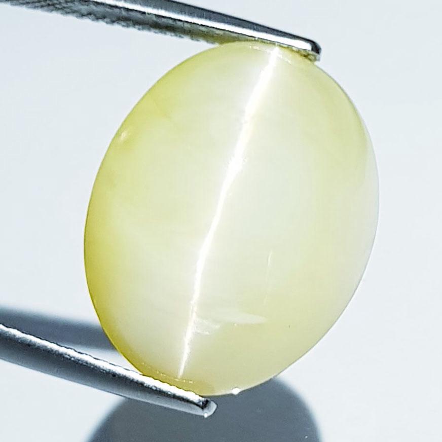 19.65 Ctz Rare Big SIZED Natural Opal Cat's Eye: No Reserve! Title: 19.65 Ctz Rare Big SIZED Natural Opal Cat's Eye Color/Clarity: Ash yellow / Semi Transparant Gemstone: Opal Carat Weight: 19.65 Size/Dimensions: 18.50 x 14.50 x 13.06 Additional Inf