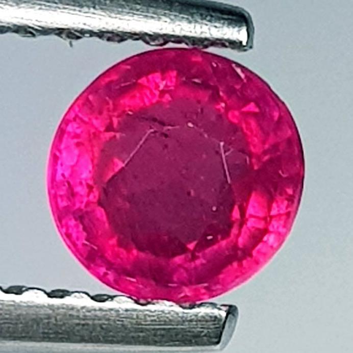 0.79 Ctz Top Quality Pinkish Red Natural Ruby: No Reserve! Title: 0.79 Ctz Top Quality Pinkish Red Natural Ruby Color/Clarity: Pinkish Red / VVS/VS Gemstone: Ruby Carat Weight: 0.79 Size/Dimensions: 5.00 x 5.00 x 3.40 Additional Information: Burma