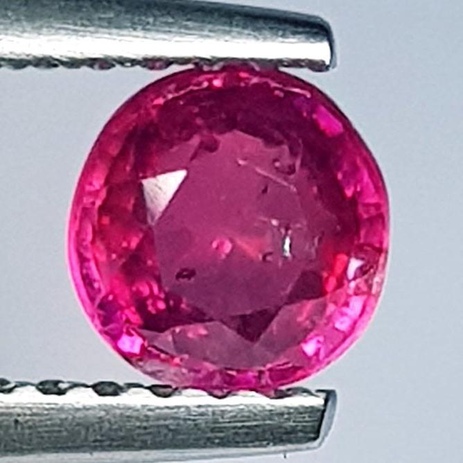 0.76 Ctz Top Quality Pinkish Red Natural Ruby: No Reserve! Title: 0.76 Ctz Top Quality Pinkish Red Natural Ruby Color/Clarity: Pinkish Red / VVS/VS Gemstone: Ruby Carat Weight: 0.76 Size/Dimensions: 5.00 x 5.00 x 3.10 Additional Information: Burma