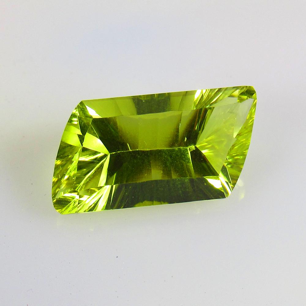 11.05 Ctw Natural Lemon Quartz Concave Cut: No Reserve! Title: 11.05 Ctw Natural Lemon Quartz Concave Cut Stone Clarity: VVS Gemstones: Natural Lemon Quartz Carat Weights: 11.05 Size/Dimensions: 21.50 x 10.50 x 8.00 mm Additional Information: T