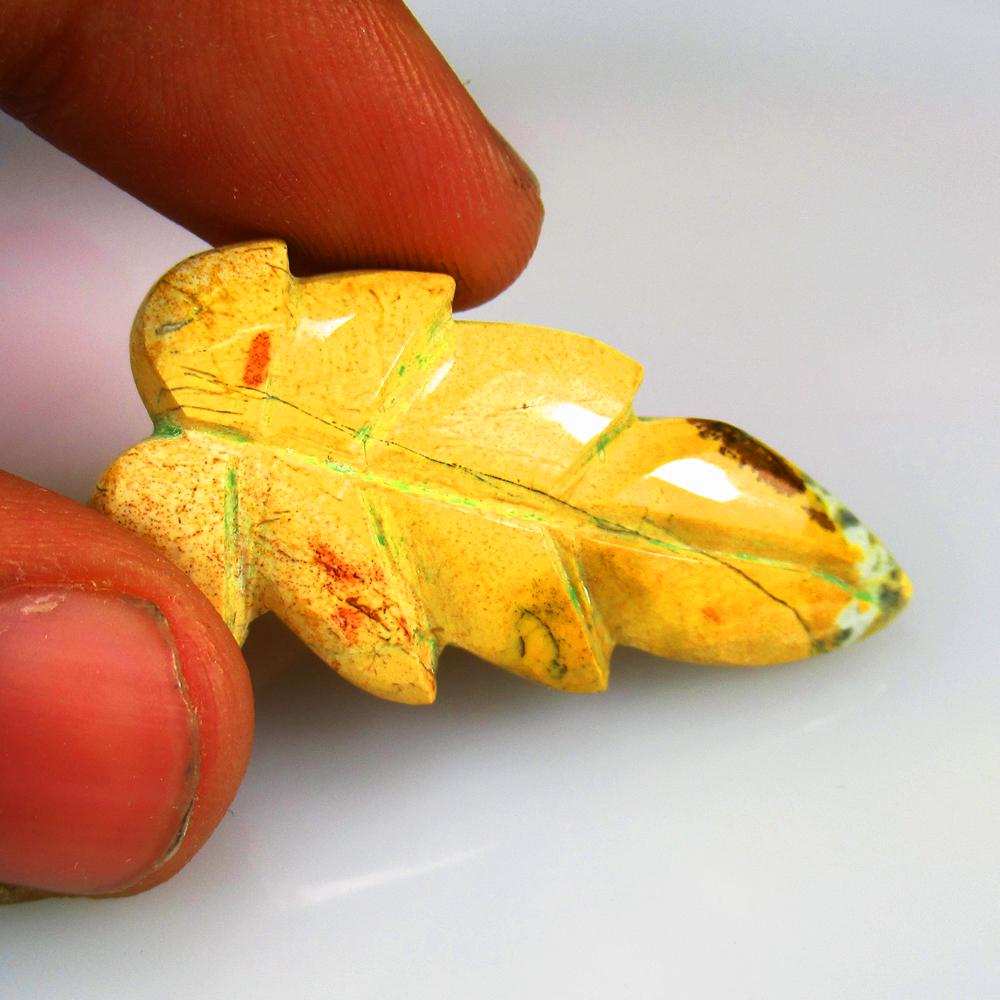 32.76 Ctw Natural Wood Jasper Flower Cabochon: No Reserve! Title: 32.76 Ctw Natural Wood Jasper Flower Cabochon Stone Clarity: Opaque Gemstones: Natural Jasper Carat Weights: 32.76 Size/Dimensions: 41.00 x 19.80 x 5.10 mm Additional Information: N