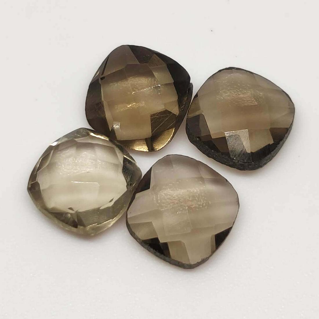 5.90 ct Natural Smoky Quartz Lot: No Reserve! Title: 5.90 ct Natural Smoky Quartz Lot Additional Information: Gemstones: Smoky Quartz Carat Weights: 5.90 ct Size/Dimensions: 8 x 8 mm Origin : Scotland Materials & Techniques: Quartz Sh