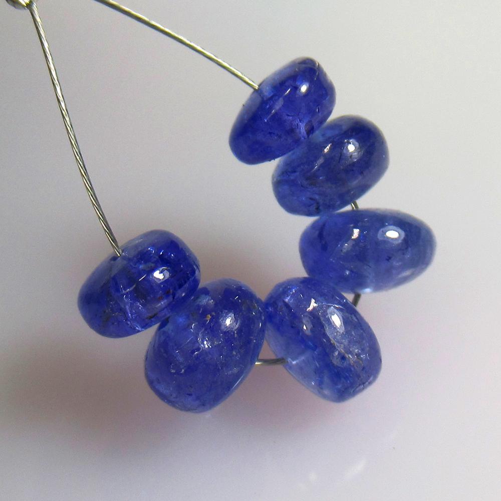 8.30 Ctw Natural 6 Drilled Tanzanite Round Beads: No Reserve! Title: 8.30 Ctw Natural 6 Drilled Tanzanite Round Beads Stone Clarity: Transparent Gemstones: Natural Tanzanite Beads Carat Weights: 8.3 Size/Dimensions: 5.60 - 6.60 mm / 6 Pc's Additional