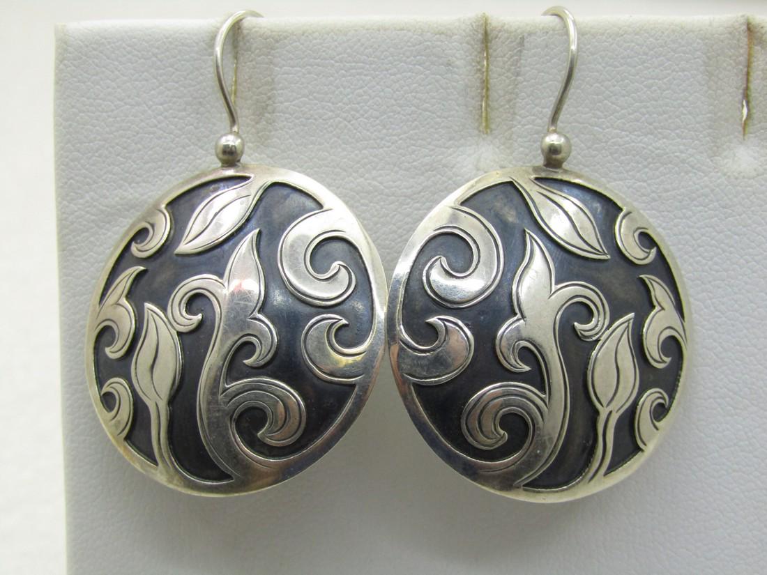Vintage Sterling Silpada Nepal Sterling Earrings, 8.85 Gr. Repousse: Vintage Sterling Silpada Nepal Sterling Earrings, 8.85 Gr. Repousse vine design with a black recessed background, locking hook posts. The earrings are 1.75" long from the curve in the posts and appx. 