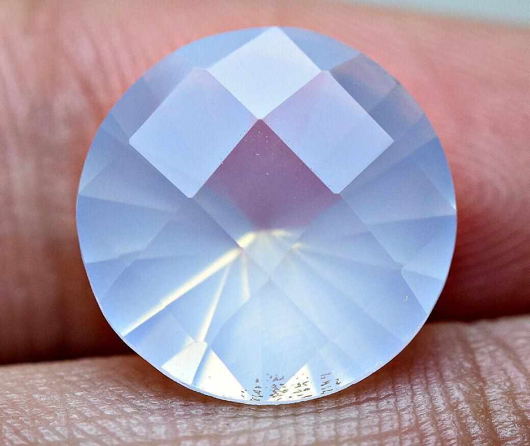 4.80 CT Ultra Rare Natural Multi Color Moonstone Classic Fancy Cut: Title: 4.80 CT Ultra Rare Natural Multi Color Moonstone Classic Fancy Cut Color/Clarity: transparent Gemstone Type: natural/untreated Carat Weights: 4.8 Size/Dimensions: 11.5 x 11.5 x7.5 mm Origin: Pa