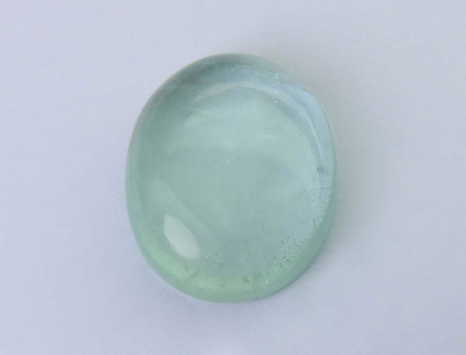 9.10 Cts Natural Green Beryl: Title: 9.10 Cts Natural Green Beryl Additional Information: Gemstone : Natural Green Beryl Origin : Brazil Weight : 9.10 Carats Dimensions : 16.51x13.17x5.23 mm Shape : Oval Cabochan Color : Green Tra