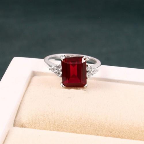 Red Ruby Gemstone 925 Sterling Silver Wedding Ring: Title: Red Ruby Gemstone 925 Sterling Silver Wedding Ring Description: Center Gemstone : Ruby Gemstone Weight : 4 Carat Approx. Access stone : Cubic zirconia Material : Lab Created Ruby Gemstone Creat