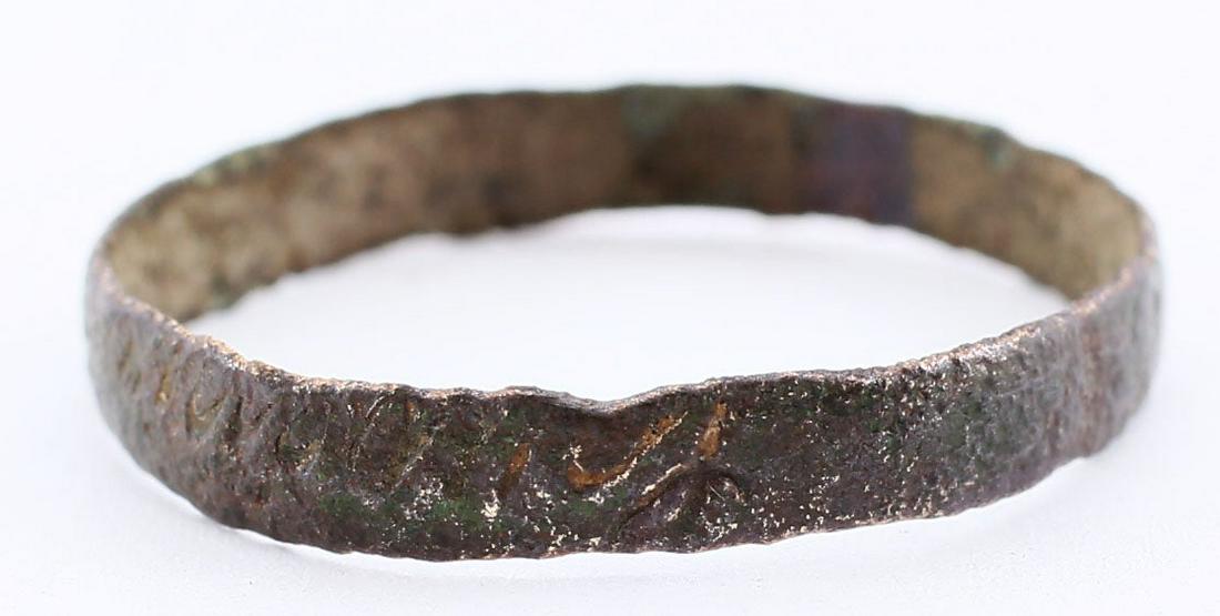 VIKING WARRIOR’S WEDDING RING AS FOUND, 900-1050 AD, SIZE 10 1/4: Bronze, size 10 1/4. 3.5mm width with rounded face. Completely untouched as found with stable very dark patina and typical of the condition that all our rings are in before refurbishing. Reserve: $130