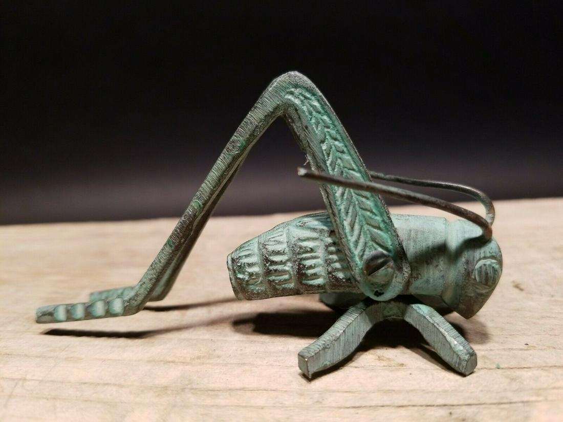 Brass Fireplace Hearth Cricket: 3 1/2" Long 1 1/8" Wide 2" Hide Wonderful antique style brass hearth cricket. Many times found on the hearth crickets are said to bring good luck and fortune to ones house and home. Nice detail and qu