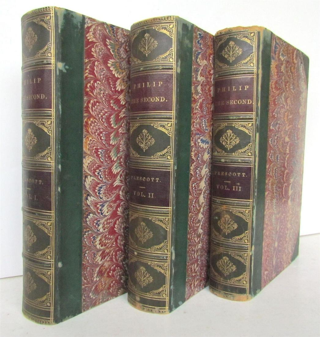 1867 PHILIP THE SECOND KING of SPAIN by W.PRESCOTT antique 3 VOLUMES DECORATIVE: HISTORY of the REIGN of PHILIP THE SECOND KING OF SPAIN 3 VOLUMES SET, COMPLETE Philadelphia, 1867 Size 5 1/4 by 8 1/4" Leather spines and corners, with gilt titles and elaborate gilt tooling to the s