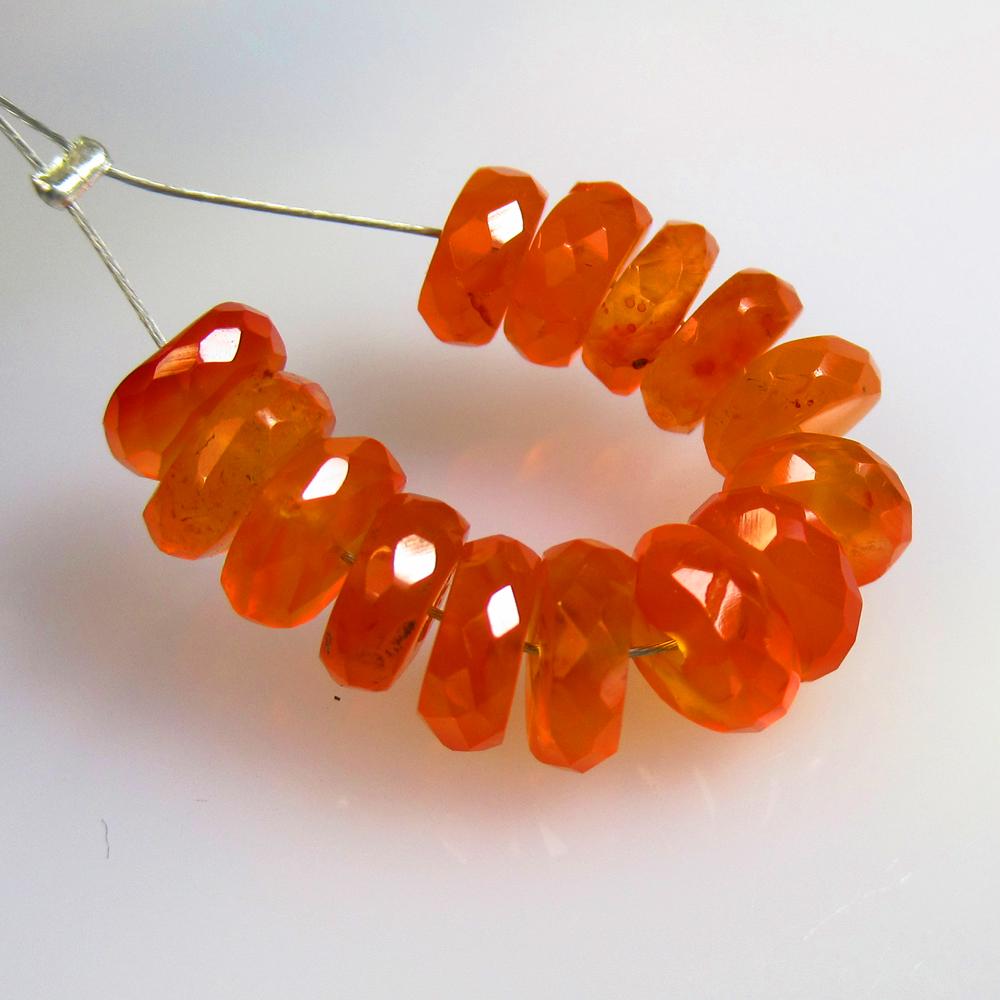 12.38 Ct Natural 14 Drilled Orange Carnelian Round Beads: No Reserve! Title: 12.38 Ct Natural 14 Drilled Orange Carnelian Round Beads Stone Clarity: Semi-Transparent Gemstones: Natural Carnelian Beads Carat Weights: 12.38 Size/Dimensions: 6.10 - 6.80 mm / 14
