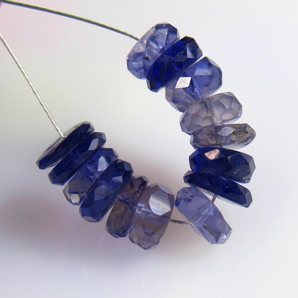10.00 Ctw Natural 14 Iolite Drilled Round Beads: No Reserve! Title: 10.00 Ctw Natural 14 Iolite Drilled Round Beads Stone Clarity: Transparent Gemstones: Natural Iolite Beads Carat Weights: 10 Size/Dimensions: 6.00 - 6.80 mm / 14 PC's Additional Inf