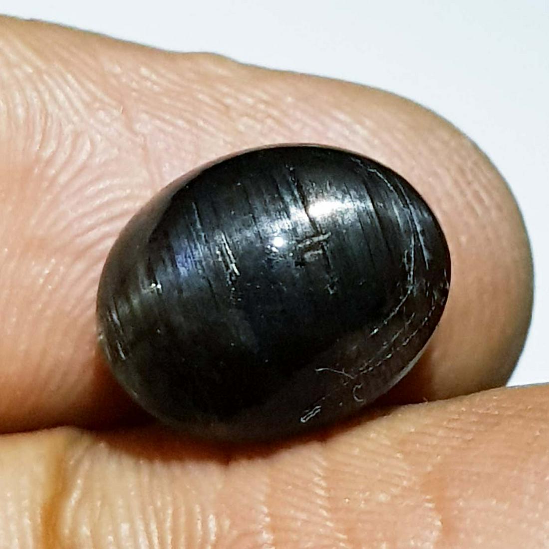 6.22 Ctz Natural Rare Golden Eye (scapolite): No Reserve! Title: 6.22 Ctz Natural Rare Golden Eye (scapolite) Color/Clarity: Golden Eye / Opaque Gemstones: Scapolite Cat's Eye Carat Weights: 6.22 12.20 x 10.20 x 6.90 Additional Information: Oval