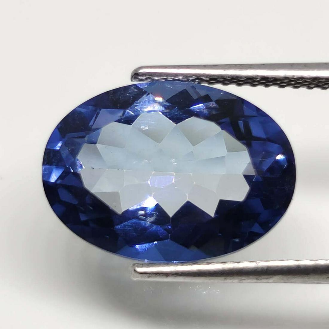 5.40 ct Rare Natural Sapphire Blue Topaz-Top Grade: No Reserve! Title: 5.40 ct Rare Natural Sapphire Blue Topaz-Top Grade Additional Information: Gemstones: Sapphire Blue Topaz Carat Weights: 5.40 ct Size/Dimensions: 14 X 10 X 6 mm Treatment: Coated Ma