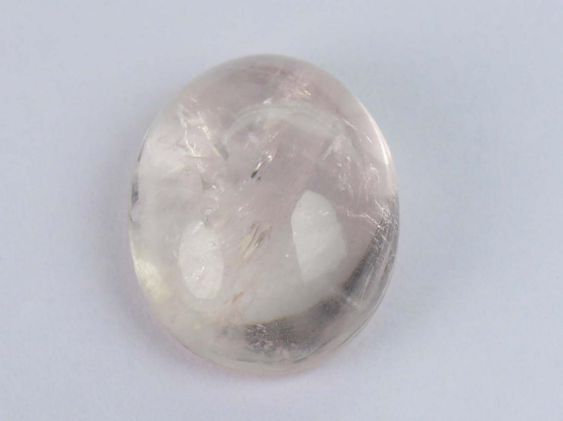 7.12 cts Natural Morganite: No Reserve! Title: 7.12 cts Natural Morganite Additional Information: Gemstone : Natural Morganite Shape and Cut : Oval Caboshon Weight : 7.12 carats Measurements : 14x11 mm Color : Peach Transprancy 