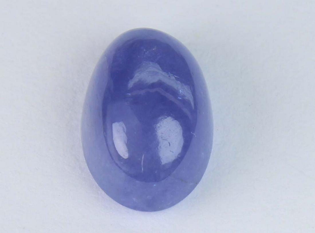 3.38 Cts Natural Tanzanite: No Reserve! Title: 3.38 Cts Natural Tanzanite Additional Information: Gemstone : Natural Tanzanite Shape and cut : Oval Cabochan Weight :3.38 Carats Measurements : 10x7 mm Color : Violet Transprancy :