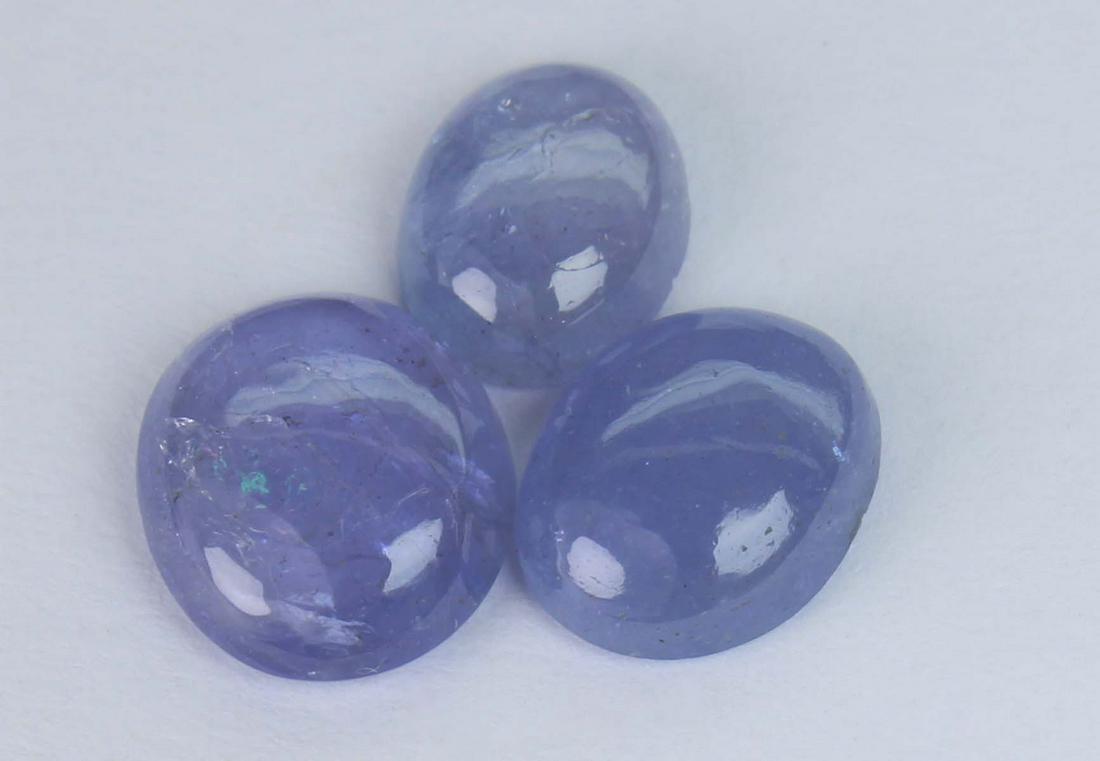 5.06 Cts Natural Tanzanite: No Reserve! Title: 5.06 Cts Natural Tanzanite Additional Information: Gemstone : Natural Tanzanite Shape and cut : Oval Cabochan Weight : 5.06 Carats Measurements : 9x8 mm , 8.55x6.95x3.06 mm , 8x6 mm