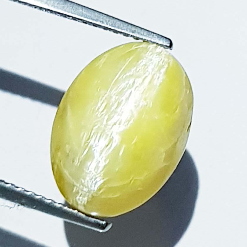 8.90 Ctz Natural Opal Cat's Eye: No Reserve! Title: 8.90 Ctz Natural Opal Cat's Eye Color/Clarity: Semi Transparent Gemstones: Opal Cat's Eye Carat Weights: 8.9 Size/Dimensions: 14.50 x 10.70 x 10.10 Additional Information: Oval - Af