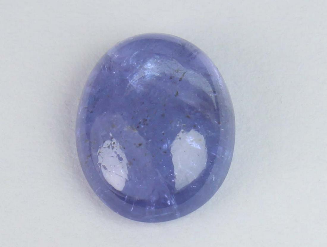 2.49 Cts Natural Tanzanite: No Reserve! Title: 2.49 Cts Natural Tanzanite Additional Information: Gemstone : Natural Tanzanite Shape and cut : Oval Cabochan Weight : 2.49 Carats Measurements : 9.78x7.62x3.60 mm Color : Violet Tr