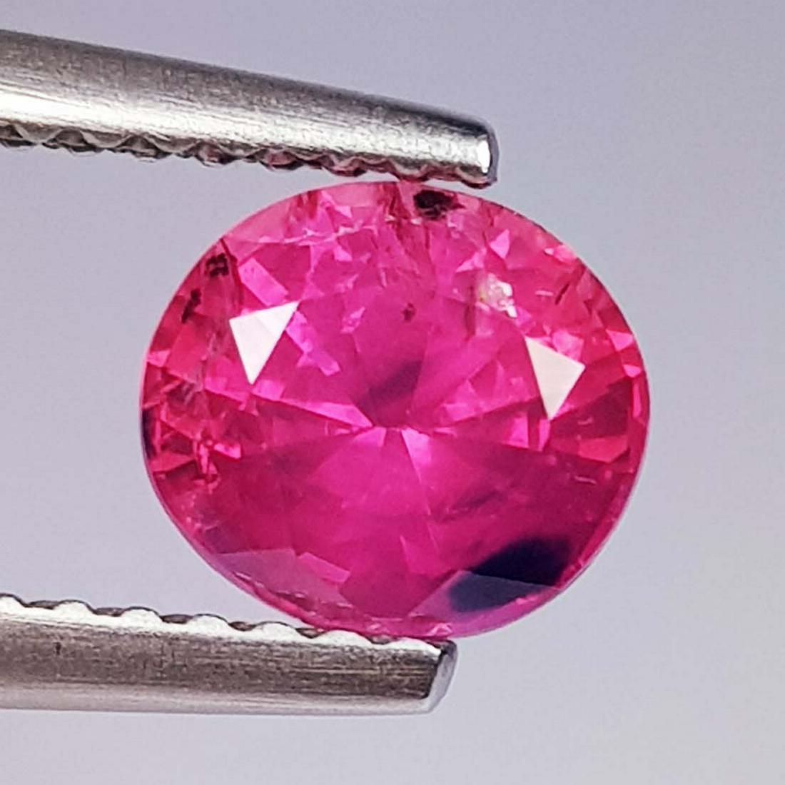 Natural Spinel Oval Cut 1.32 Ctz: No Reserve! Title: Natural Spinel Oval Cut 1.32 Ctz Color/Clarity: Pink / VVS Gemstones: Spinel Carat Weights: 1.32 6.50 x 6.00 x 4.50 Additional Information: Oval - Burma Shipping: Domestic: Flat-rat
