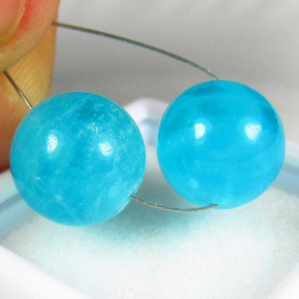 Natural Amazonite Beads - 14.20 Ct: No Reserve! Title: Natural Amazonite Beads - 14.20 Ct Origin: Brazil Weight: 14.2 Size/Dimensions: 10.5 x 10.5 mm Additional Information: Pieces : 2 No's / Shape : Round Drilled / Color : Blue / Clari