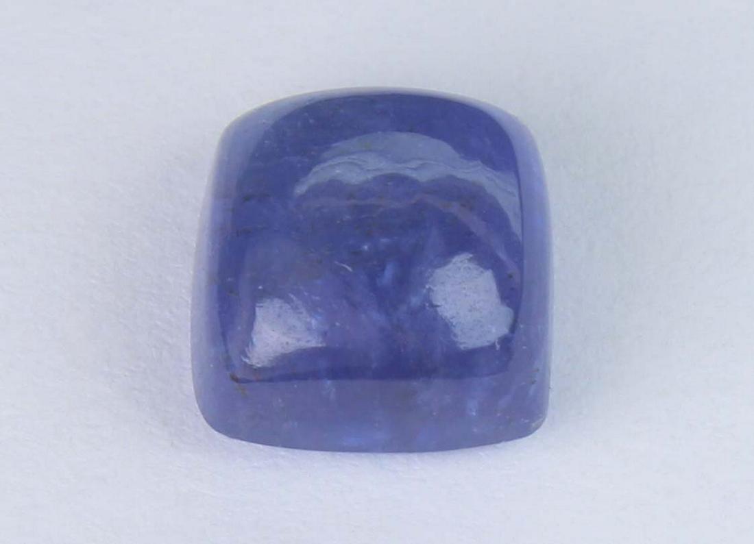 3.38 Cts Natural Tanzanite: No Reserve! Title: 3.38 Cts Natural Tanzanite Additional Information: Gemstone : Natural Tanzanite Shape and cut : Square Coshion Cabochan Weight :3.38 Carats Measurements : 7.57x7.57x5.12 mm Color : 