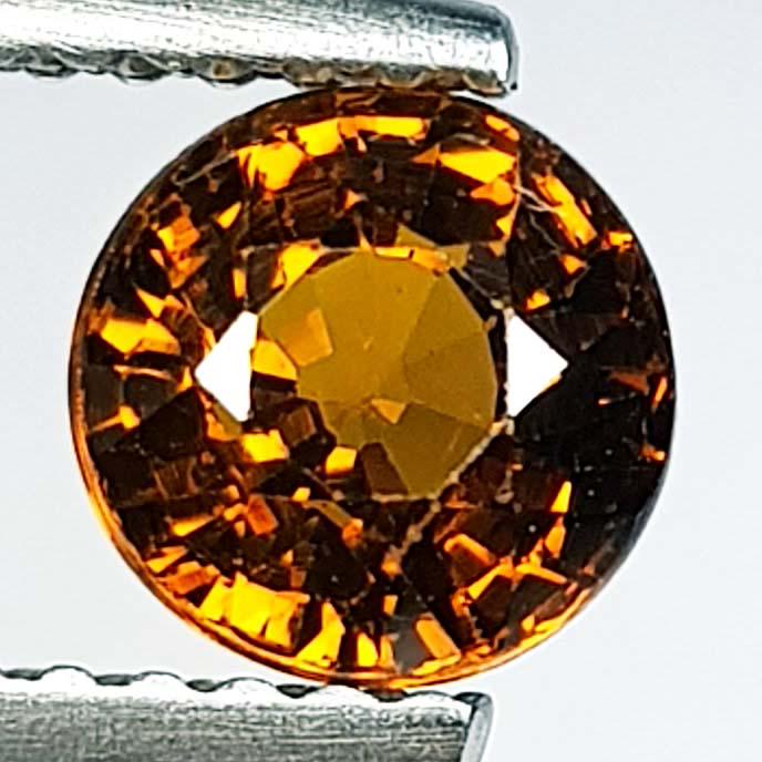 1.29 Ctz Natural Mali Garnet: No Reserve! Title: 1.29 Ctz Natural Mali Garnet Color/Clarity: Brownish Yellow / VVS Gemstones: Garnet 1.29 6.08 x 6.08 x 4.68 Additional Information: Round / Mali Shipping: Domestic: Flat-rate of $7.