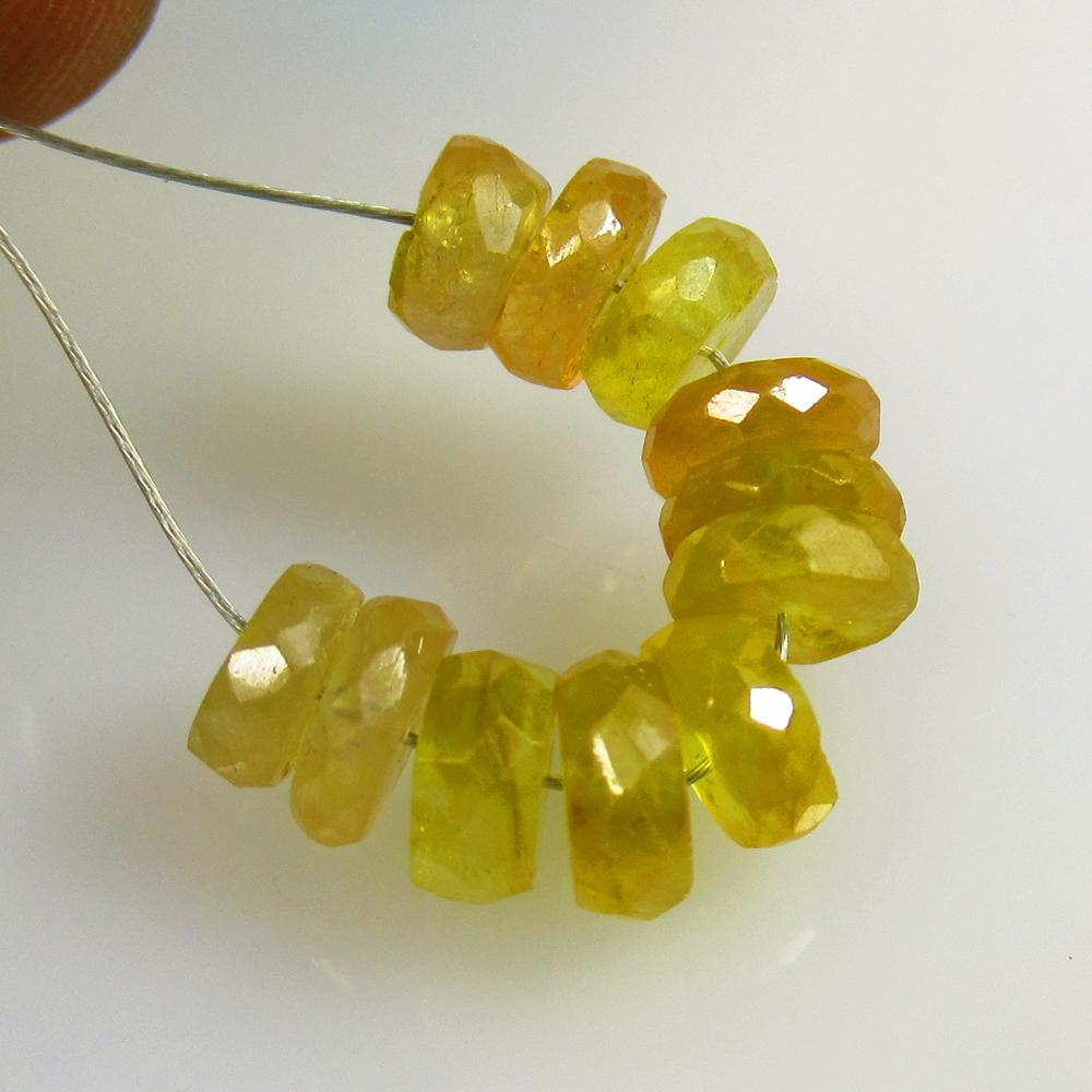9.07 Ctw Natural 11 Yellow Sapphire Round Beads: No Reserve! Title: 9.07 Ctw Natural 11 Yellow Sapphire Round Beads Stone Clarity: Transparent Gemstones: Natural Sapphire Beads Carat Weights: 9.07 Size/Dimensions: 4.80 to 5.70 mm / 11 PC's Additiona