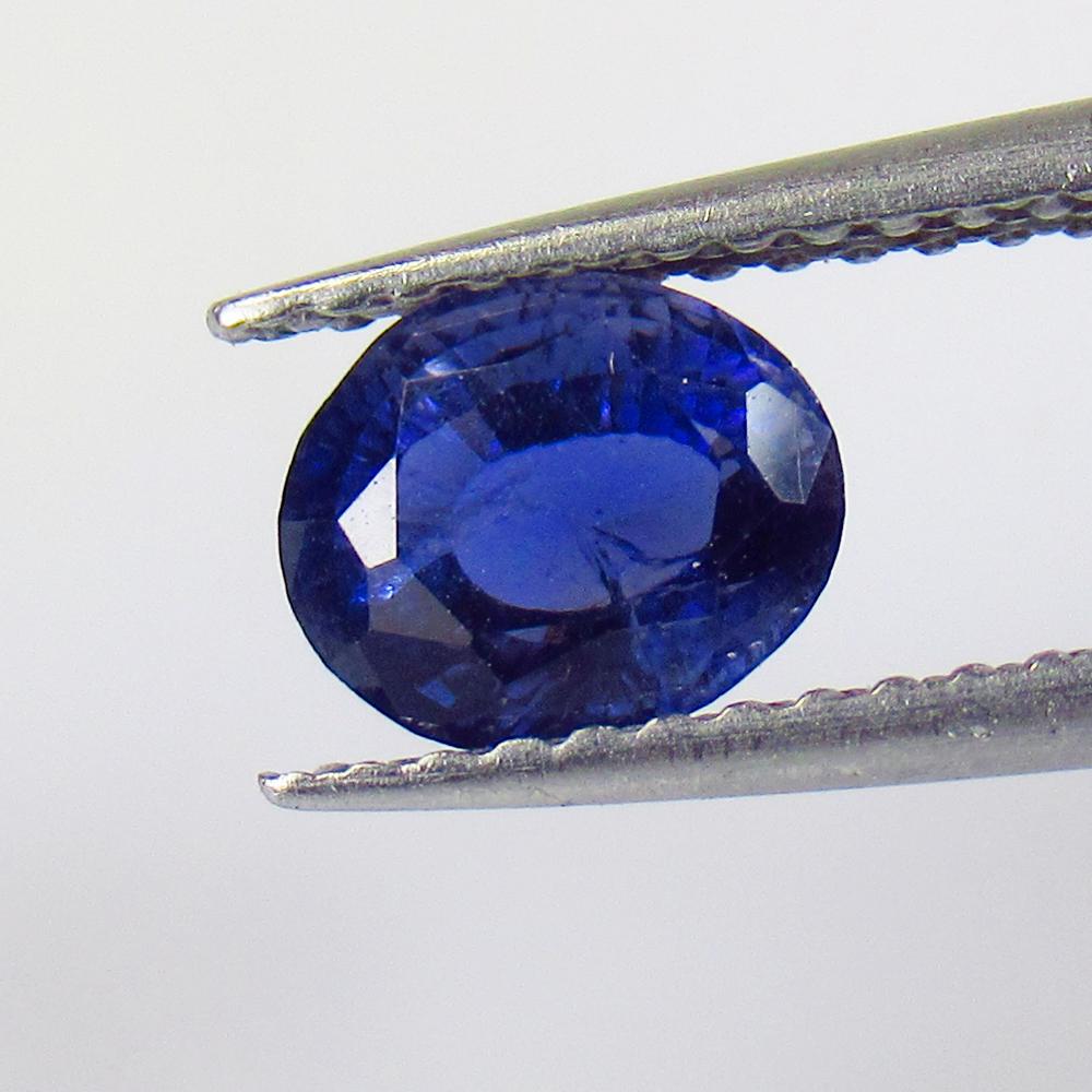 0.90 Ctw Natural Iolite Oval Cut: No Reserve! Title: 0.90 Ctw Natural Iolite Oval Cut Stone Clarity: VVS Gemstones: Natural Iolite Carat Weights: 0.9 Size/Dimensions: 6.50 x 5.5 x 4.50 mm Additional Information: Very Good Luster / Exc