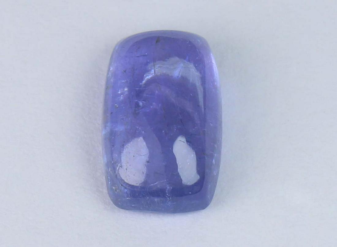 2.27 Cts Natural Tanzanite: No Reserve! Title: 2.27 Cts Natural Tanzanite Additional Information: Gemstone : Natural Tanzanite Shape and cut : Rectangular Cabochan Weight : 2.27 Carats Measurements : 9.52x5.90x3.79 mm Color : Vi