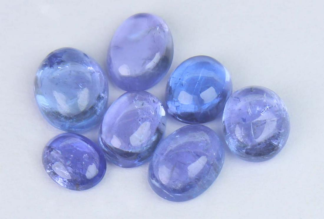 3.38 Cts Natural Tanzanite: No Reserve! Title: 3.38 Cts Natural Tanzanite Additional Information: Gemstone : Natural Tanzanite Shape and cut : Oval Cabochan Weight :3.38 Carats Measurements : 9x8 mm , 8.55x6.95x3.06 mm , 8x6 mm 