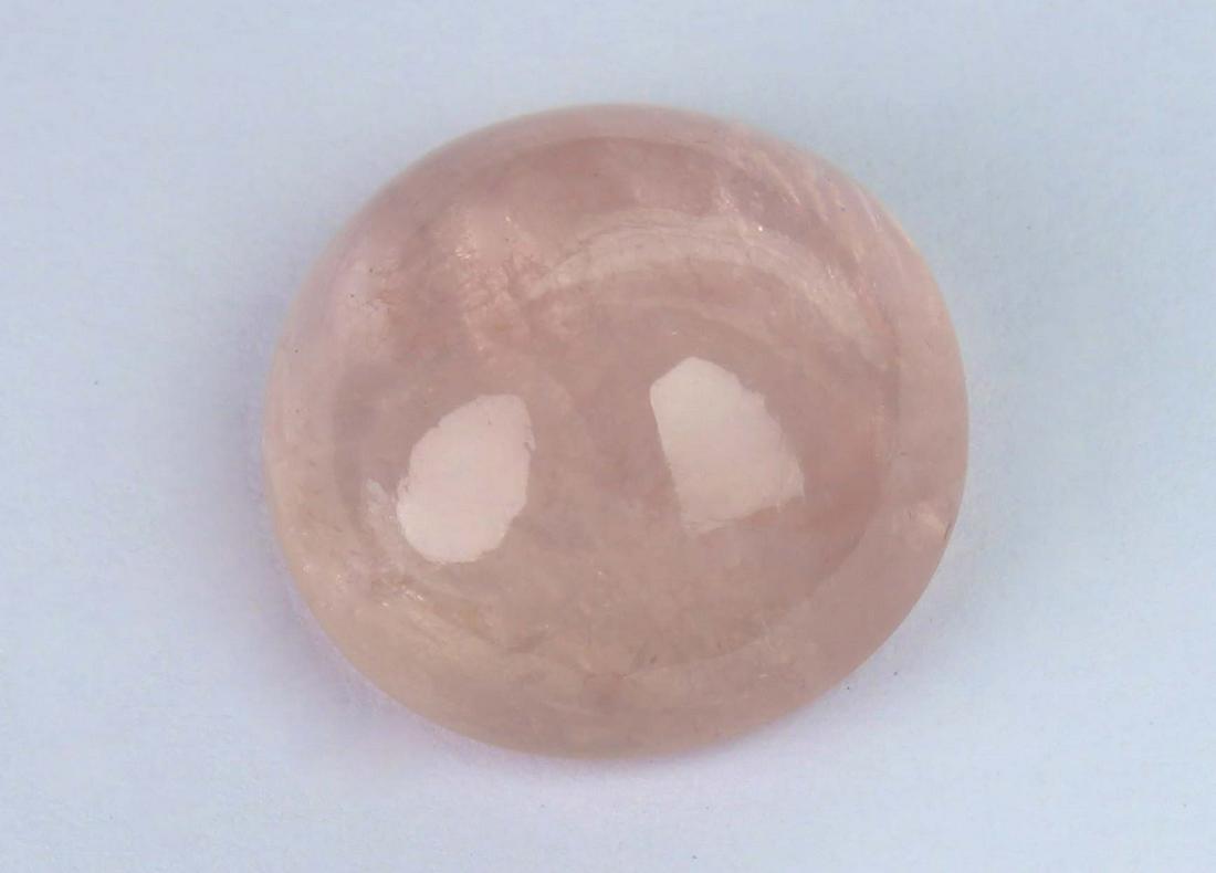 12.17 cts Natural Morganite: No Reserve! Title: 12.17 cts Natural Morganite Additional Information: Gemstone : Natural Morganite Shape and Cut : Round Caboshon Weight : 12.17 carats Measurements : 15-15 mm Color : Peach Transpran